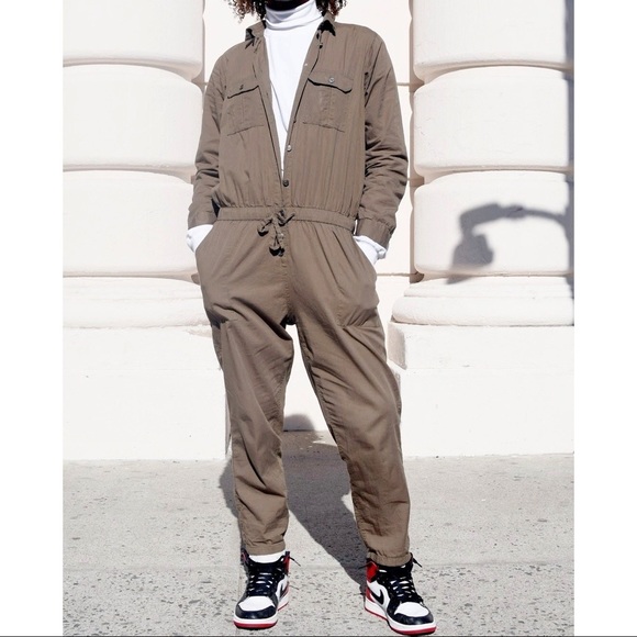 boiler suit tied around waist